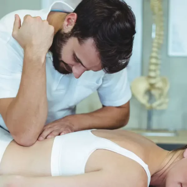 physiotherapist-giving-back-massage-to-a-woman-T6ETUQY_02-1130x580